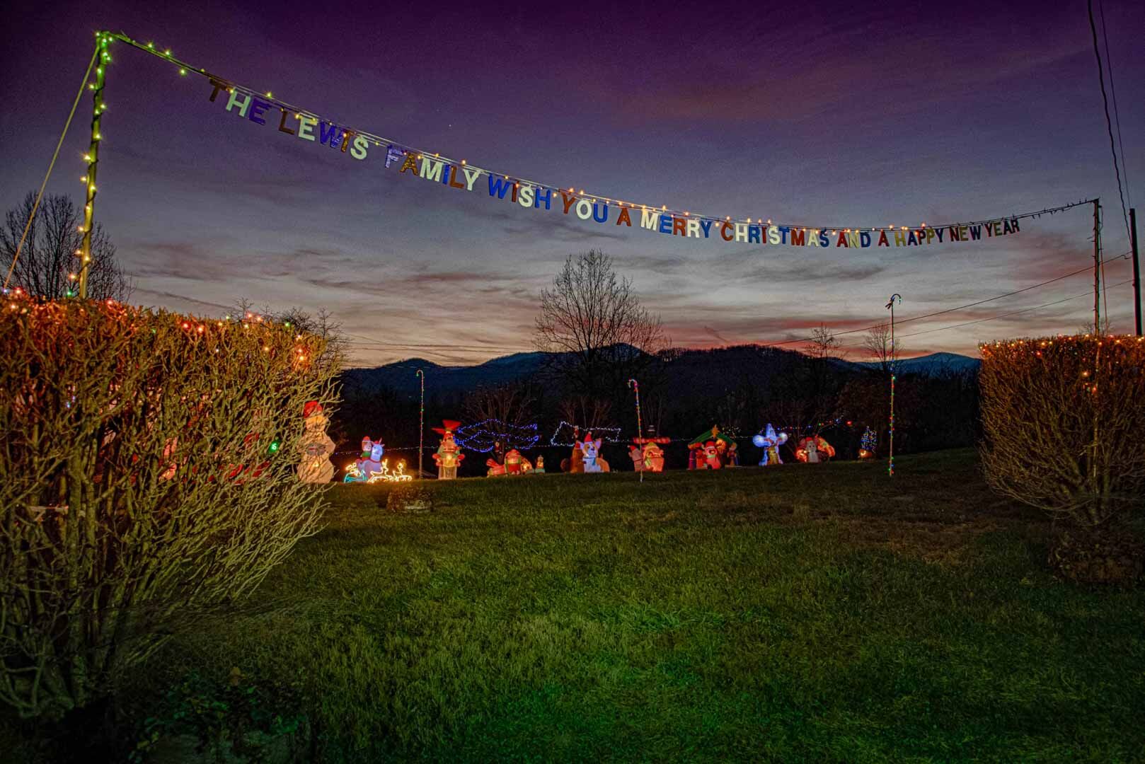 Tom Lewis welcomes visitors to enjoy his incredible display of holiday lights